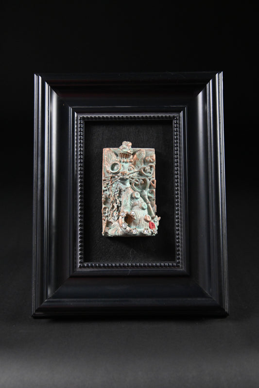 Cheshire Cat 1 (the one with the cupcake on top)